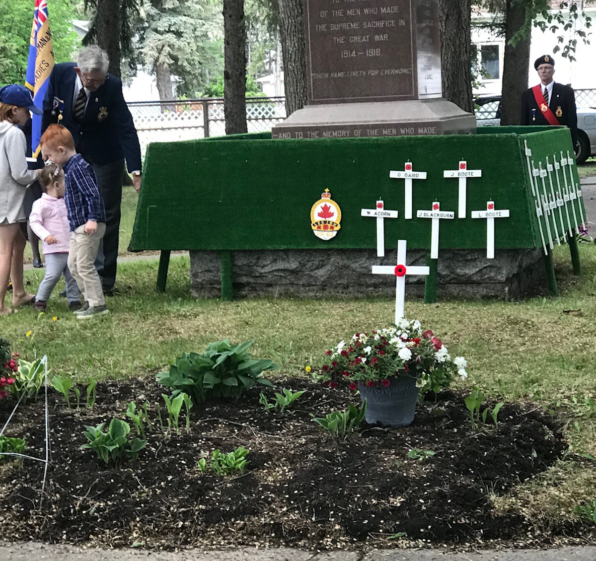 Children of the area hanging crosses