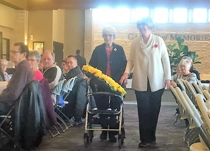 Ladena and Patricia laying the wreath