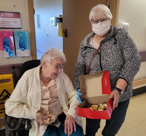 Pictured is Audrey with Pat McCallum, daughter of HKV and POW, 
				Lawrence Ross (RRC)